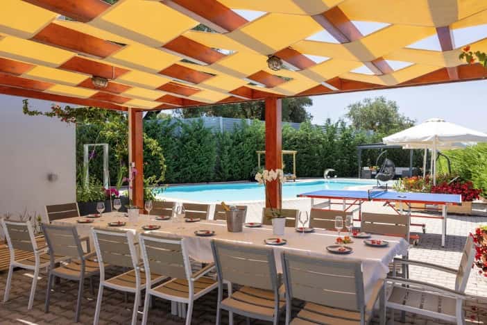 Traditional dish dining by the pool